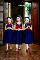 Flower girls enter the ceremony at Château Rhianfa Anglesey