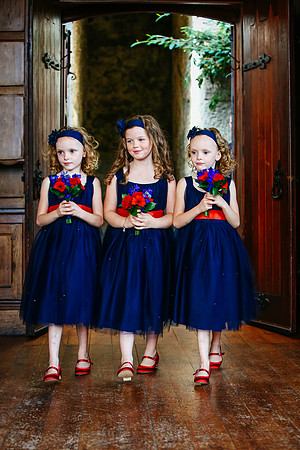 Flower girls enter the ceremony at Château Rhianfa Anglesey