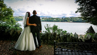 The Couple look out over the mainland from Château Rhianfa Anglesey